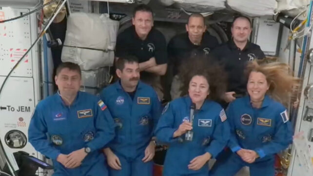 Seven astronauts at the ISS