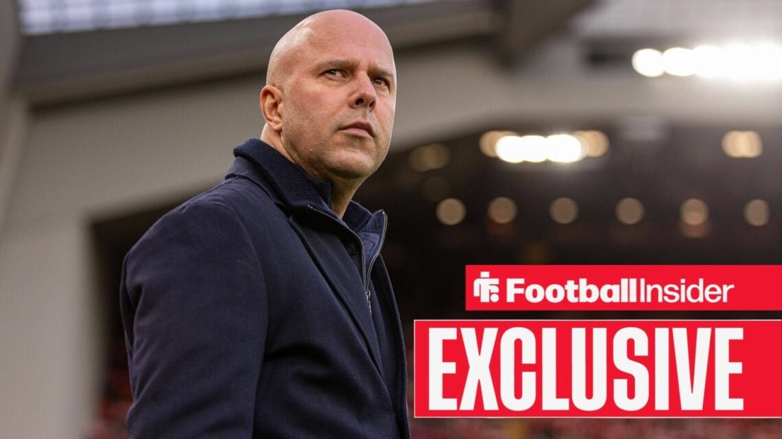 Liverpool manager Arne Slot stares towards the sky at Anfield.