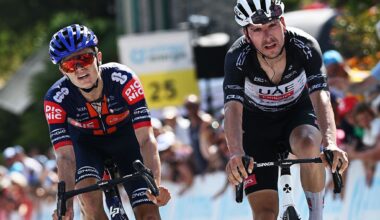 SANTA MARIA IN CALANCA, SWITZERLAND - JUNE 19: (L-R) Oscar Onley of Great Britain and Team Picnic PostNL reacts as stage winner ahead of Joao Almeida of Portugal and UAE Team Emirates - XRG - Black Points Jersey during the 88th Tour de Suisse, Stage 5 a 183.8km stage from La Punt to Santa Maria in Calanca 941m / #UCIWT / on June 19, 2025 in Santa Maria in Calanca, Switzerland. (Photo by Tim de Waele/Getty Images)