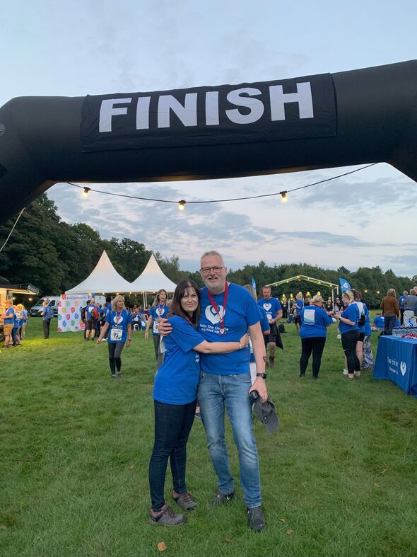 Duncan completing a charity Walk of Hope with Kay