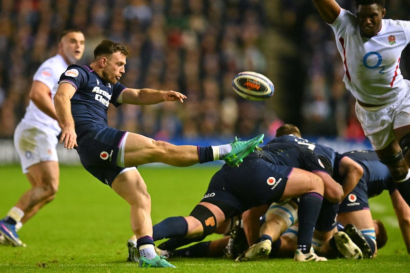 Scotland's scrumhalf Ben White kicks the ball. Photograph: Andy Buchanan/AFP via Getty