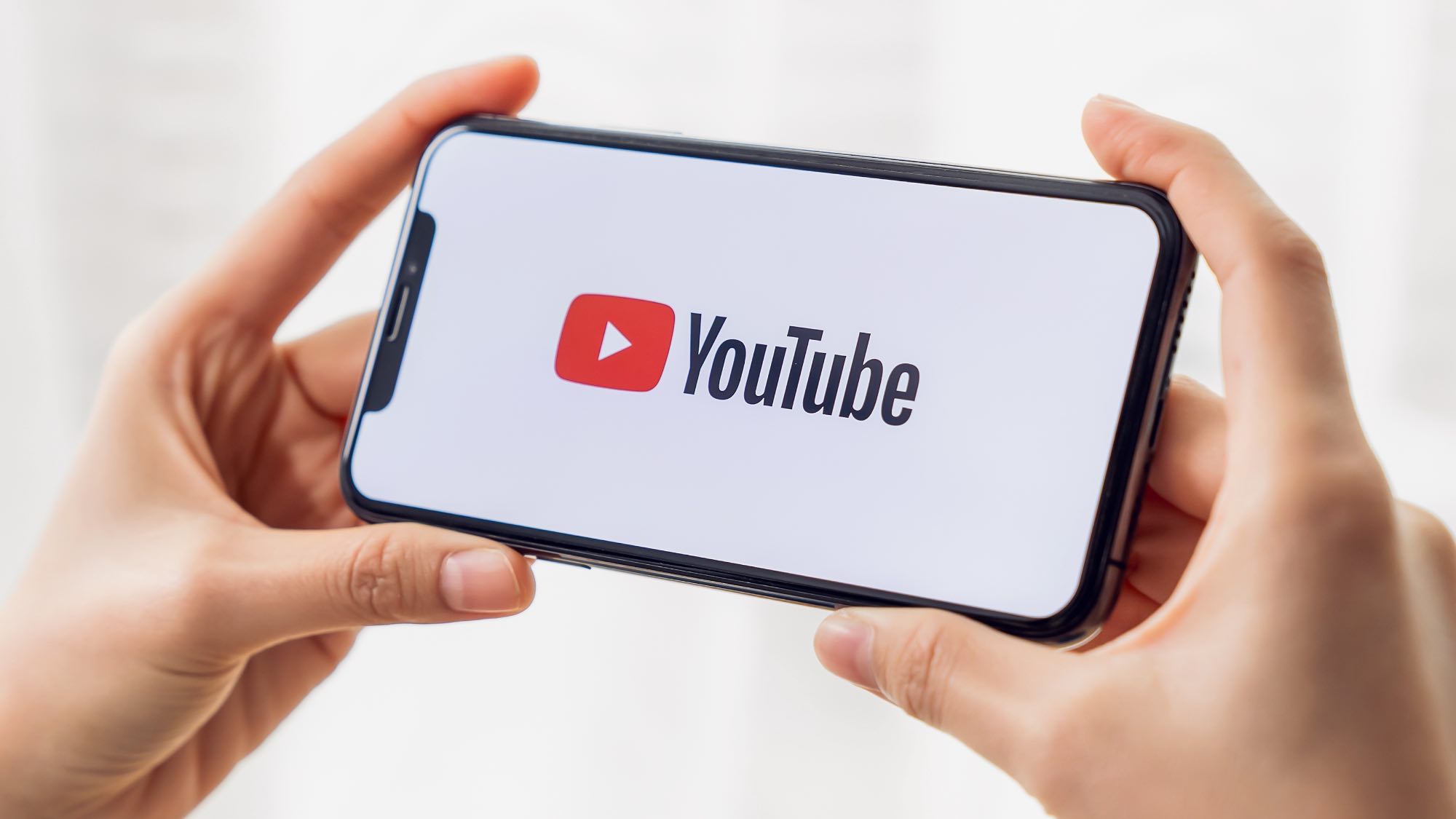 YouTube logo on phone