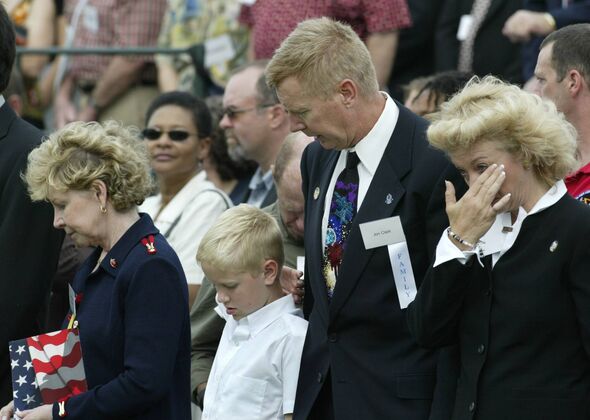 Family members of shuttle astronauts attend a dedication ceremony at the National Space Mirror Memorial at the Kennedy Space Center in Cape Canaveral, Family members of shuttle astronauts attend a dedication ceremony at the National Space Mirror Memorial at the Kennedy Space Center in Cape Canaveral,
