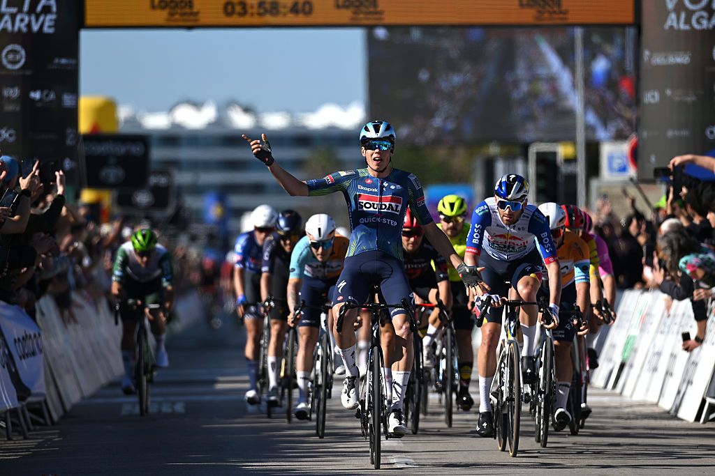 LAGOS, PORTUGAL - FEBRUARY 21: (L-R) Paul Magnier of France and Team Soudal Quick-Step celebrates at finish line as stage winner ahead of Jordi Meeus of Belgium and Team Red Bull - BORA - hansgrohe during the 52nd Volta ao Algarve em Bicicleta 2026, Stage 4 a 175.1km stage from Albufeira to Lagos on February 21, 2026 in Lagos, Portugal. (Photo by Dario Belingheri/Getty Images)