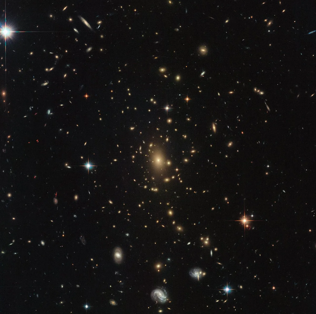 Galaxy cluster RXC J2211.7-0350 and gravitational lensing. Credit: ESA/Hubble & NASA, RELICS