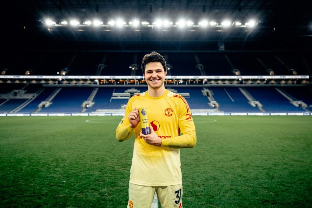 Senne Lammens poses with his Player of the Match award after the Premier League match between Everton and Manchester United at the Hill Dickinson Stadium in 2026 in Liverpool, England.