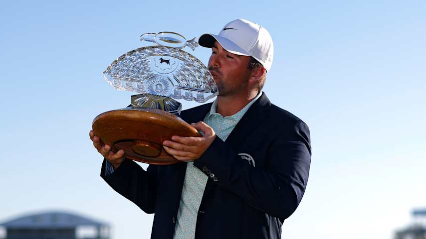 SCOTTSDALE, ARIZONA - FEBRUARY 08: Chris Gotterup of the United States poses with the winner's trophy after winning the WM Phoenix Open 2026 at TPC Scottsdale on February 08, 2026 in Scottsdale, Arizona. (Photo by Justin Edmonds/Getty Images)