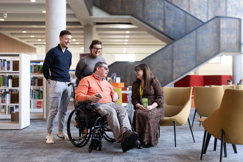 Darragh Power, Re-Hab Officer Headway, Cora Gunter, Senior Executive Librarian and Eilish Murrihy, Branch Librarian with Brian Hogan at the DeValera Library. Photograph: Eamon Ward