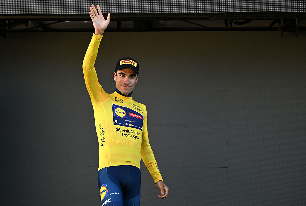VILLAMOURA, PORTUGAL - FEBRUARY 20: Juan Ayuso of Spain and Team Lidl - Trek celebrates at podium as Yellow Leader Jersey winner during the 52nd Volta ao Algarve em Bicicleta 2026, Stage 3 a 19.5km individual time trial stage from Vilamoura to Vilamoura on February 20, 2026 in Vilamoura, Portugal. (Photo by Dario Belingheri/Getty Images)