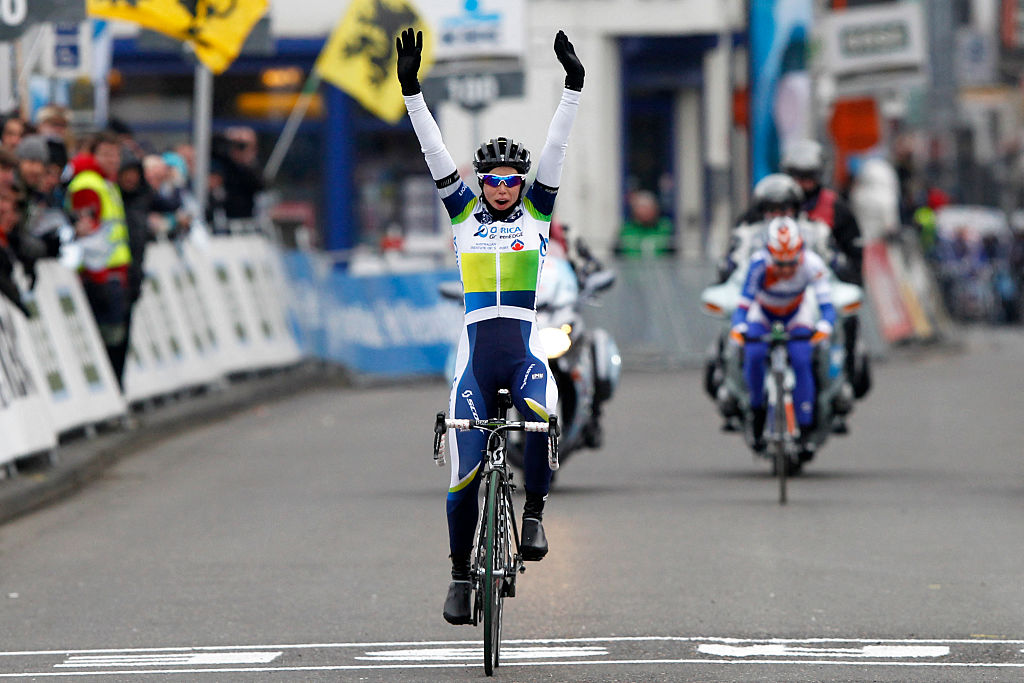 Australia's Tiffany Cromwell of Orica-GreenEdge celebrates as she crosses the finish line to win the Omloop Het Nieuwsblad cycling race on February 23, 2013 in Gent. AFP PHOTO / BELGA PHOTO / KRISTOF VAN ACCOM (Photo by KRISTOF VAN ACCOM / BELGA / AFP)