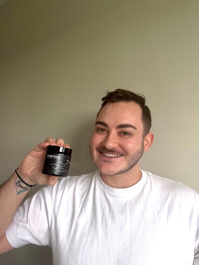 Male holds Centred Tender Love and Hair - Men's Hair Vitamins