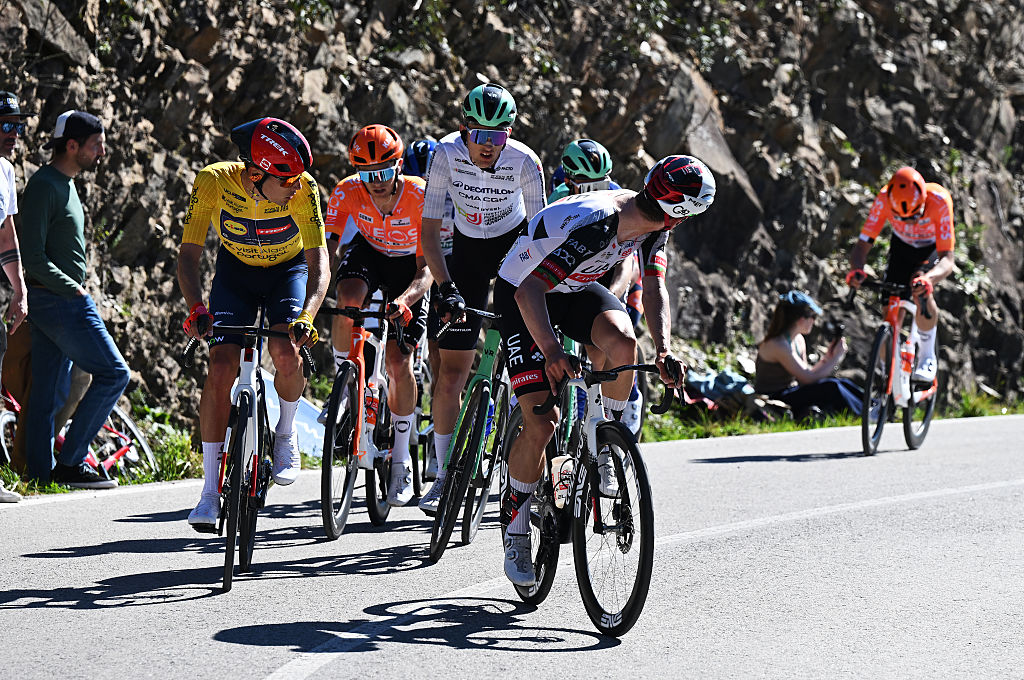 LOULE, PORTUGAL - FEBRUARY 22: (L-R) Juan Ayuso of Spain and Team Lidl - Trek - Yellow leader jersey, Oscar Onley of Great Britain and Team INEOS Grenadiers, Paul Seixas of France and Team Decathlon CMA CGM - White best young jersey, Joao Almeida of Portugal and UAE Team Emirates - XRG compete during the 52nd Volta ao Algarve em Bicicleta 2026, Stage 5 a 148.4km stage from Faro to Malhao - Loule 512m on February 22, 2026 in Loule, Portugal. (Photo by Dario Belingheri/Getty Images)