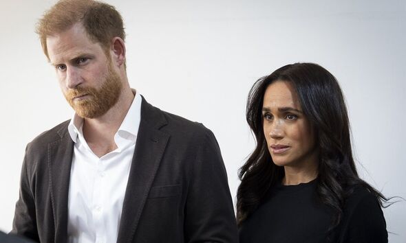 The Duke and Duchess of Sussex looking worried