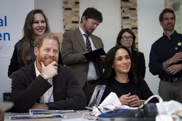 Prince Harry and Meghan Markle during a visit to the World Central Kitchen Food