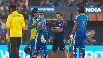 India's captain Suryakumar Yadav and Washington Sundar interact with head coach Gautam Gambhir (PTI)