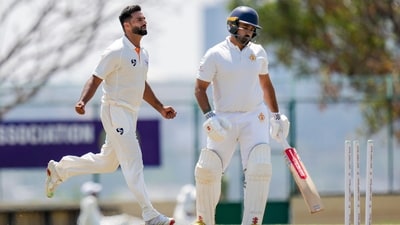 Jammu and Kashmir's Auqib Nabi, left, celebrates after taking the wicket of Karnataka's Karun Nair during Day 3 of the Ranji Trophy 2025-26 final (PTI)