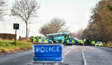 Ballyrobin Road: Woman dies after car collides with bus near international airport