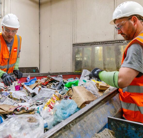 Recycling plant workers Recycling plant workers
