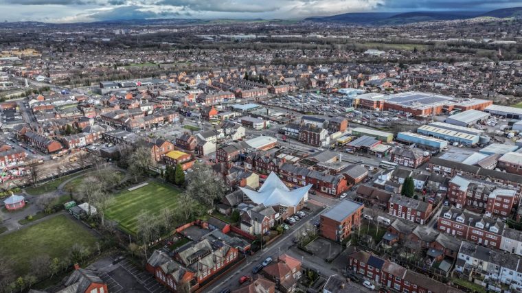 DENTON, UNITED KINGDOM - JANUARY 30: An aerial view of homes on January 30, 2026 in Denton, United Kingdom. A by-election in the Gorton and Denton constituency is scheduled to take place on Thursday, February 26, 2026, triggered by the resignation of former Labour MP Andrew Gwynne due to ill health following his suspension from the party in 2025.??Reform UK is targeting disillusioned voters following Labour's controversial decision to block Greater Manchester Mayor Andy Burnham from standing as their candidate and Nigel Farage has stated the party is in with a "serious shout" to win this traditionally safe Labour seat. Betting odds at the end of January place Reform UK as the favourite at 11/8, followed by the Green Party at 13/8 and Labour at 11/4. (Photo by Christopher Furlong/Getty Images)