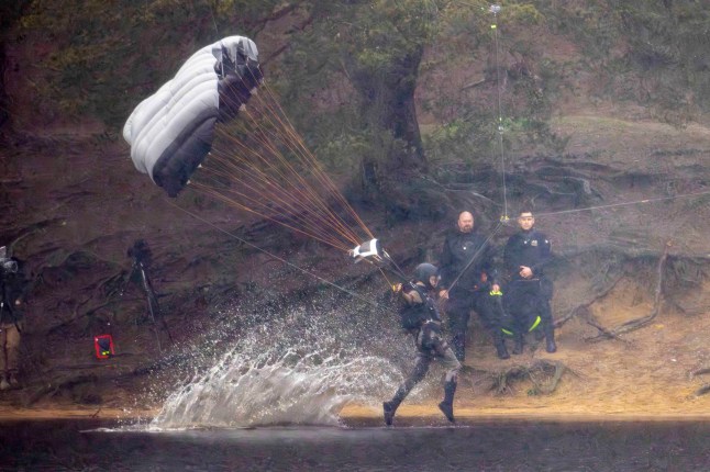 6 February 2026 - EXCLUSIVE. SOPHIE'S BIG RAID! Sophie Turner was spotted for the first time stepping into the role of legendary adventurer Lara Croft as filming got underway on the new Tomb Raider. The actress made a dramatic entrance, parachuting onto a beach during the opening scenes, while cameras rolled on location in Surrey, UK. But it wasn't quite Hollywood sunshine, as Turner was seen battling the British weather with rain pouring down over the set, soaking the cast and crew as filming continued regardless. The reboot is penned by Phoebe Waller-Bridge, with the action-packed scenes offering the first tantalising glimpse of Sophie's take on the iconic video-game heroine. Credit: CLICK NEWS AND MEDIA Ref: Dandef **Exclusive to CLICK NEWS AND MEDIA** CLICK NEWS AND MEDIA - PICTURES@CLICKNEWSANDMEDIA.COM - 07774 321240 -