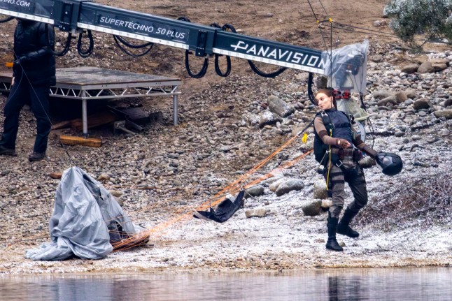 6 February 2026 - EXCLUSIVE. SOPHIE'S BIG RAID! Sophie Turner was spotted for the first time stepping into the role of legendary adventurer Lara Croft as filming got underway on the new Tomb Raider. The actress made a dramatic entrance, parachuting onto a beach during the opening scenes, while cameras rolled on location in Surrey, UK. But it wasn't quite Hollywood sunshine, as Turner was seen battling the British weather with rain pouring down over the set, soaking the cast and crew as filming continued regardless. The reboot is penned by Phoebe Waller-Bridge, with the action-packed scenes offering the first tantalising glimpse of Sophie's take on the iconic video-game heroine. Credit: CLICK NEWS AND MEDIA Ref: Dandef **Exclusive to CLICK NEWS AND MEDIA** CLICK NEWS AND MEDIA - PICTURES@CLICKNEWSANDMEDIA.COM - 07774 321240 -