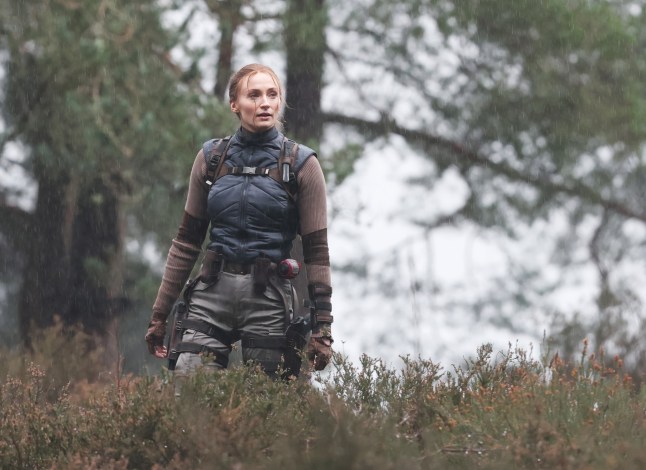 6 February 2026 - EXCLUSIVE. SOPHIE'S BIG RAID! Sophie Turner was spotted for the first time stepping into the role of legendary adventurer Lara Croft as filming got underway on the new Tomb Raider. The actress made a dramatic entrance, parachuting onto a beach during the opening scenes, while cameras rolled on location in Surrey, UK. But it wasn't quite Hollywood sunshine, as Turner was seen battling the British weather with rain pouring down over the set, soaking the cast and crew as filming continued regardless. The reboot is penned by Phoebe Waller-Bridge, with the action-packed scenes offering the first tantalising glimpse of Sophie's take on the iconic video-game heroine. Credit: CLICK NEWS AND MEDIA Ref: Dandef **Exclusive to CLICK NEWS AND MEDIA** CLICK NEWS AND MEDIA - PICTURES@CLICKNEWSANDMEDIA.COM - 07774 321240 -