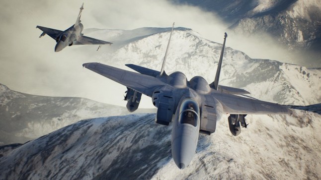 Ace Combat 7 two fighter jets flying above mountain range