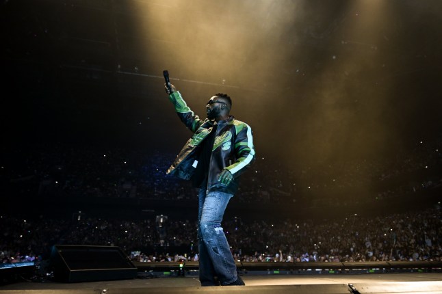 MANCHESTER, ENGLAND - NOVEMBER 22: Tinie Tempah performs on stage at Hits Radio Live 2025 at Co-op Live on November 22, 2025 in Manchester, England. (Photo by Anthony Devlin/Getty Images for Bauer)