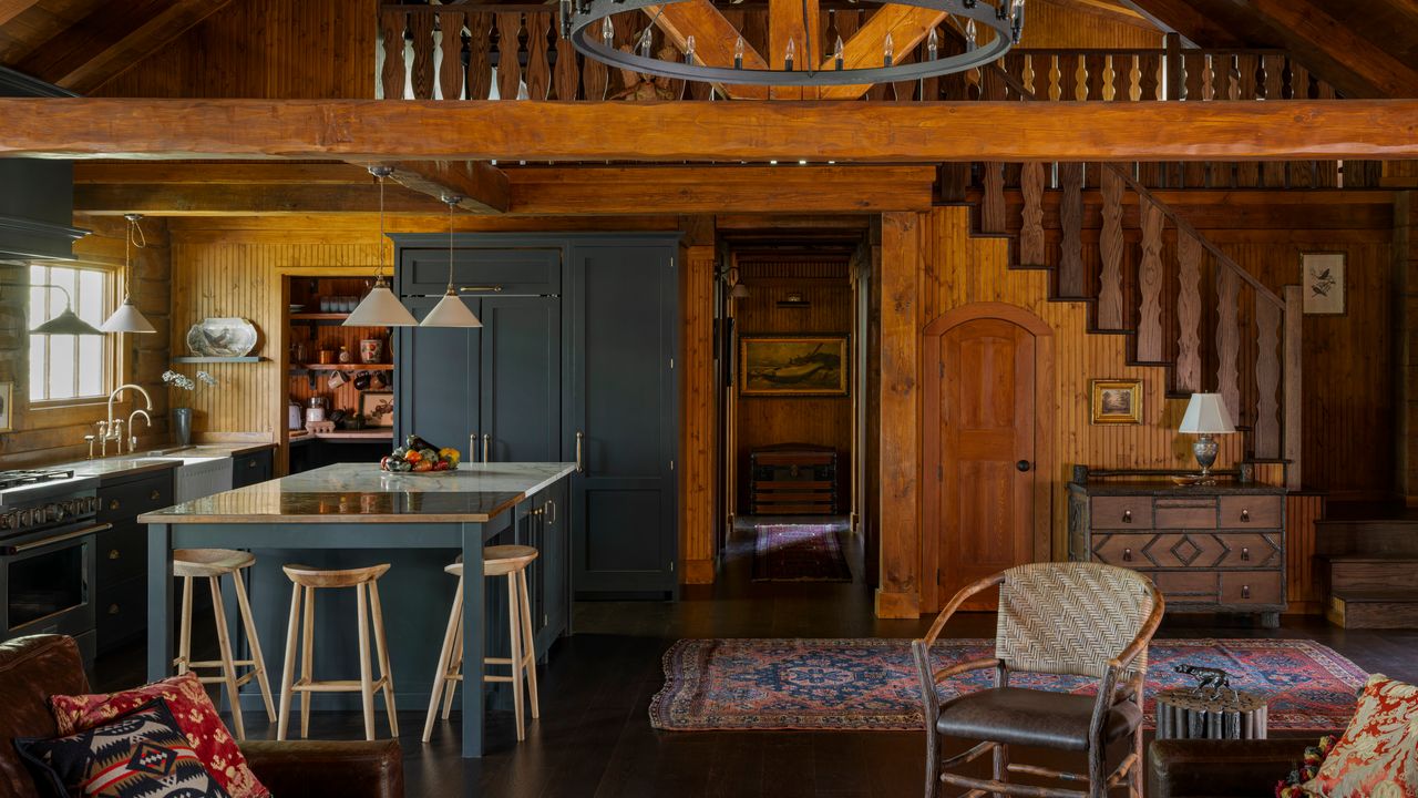 A pair of log cabins on a remote Minnesota island, decorated with an elegant European sensibility