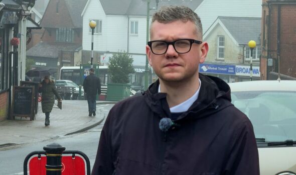 Adam Toms stands in Crowborough street