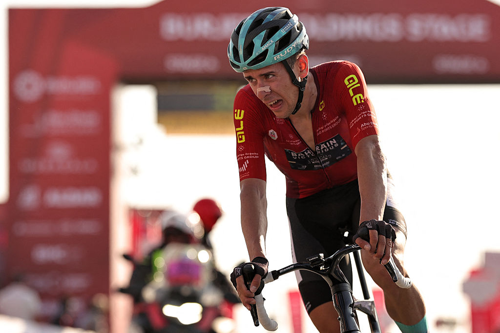 Bahrain Victorious's Italian rider Antonio Tiberi reacts after finishing the sixth stage of the UAE Tour cycling event from al-Ain Museum to Jebel Hafeet in Abu Dhabi on February 21, 2026. (Photo by Fadel SENNA / AFP)