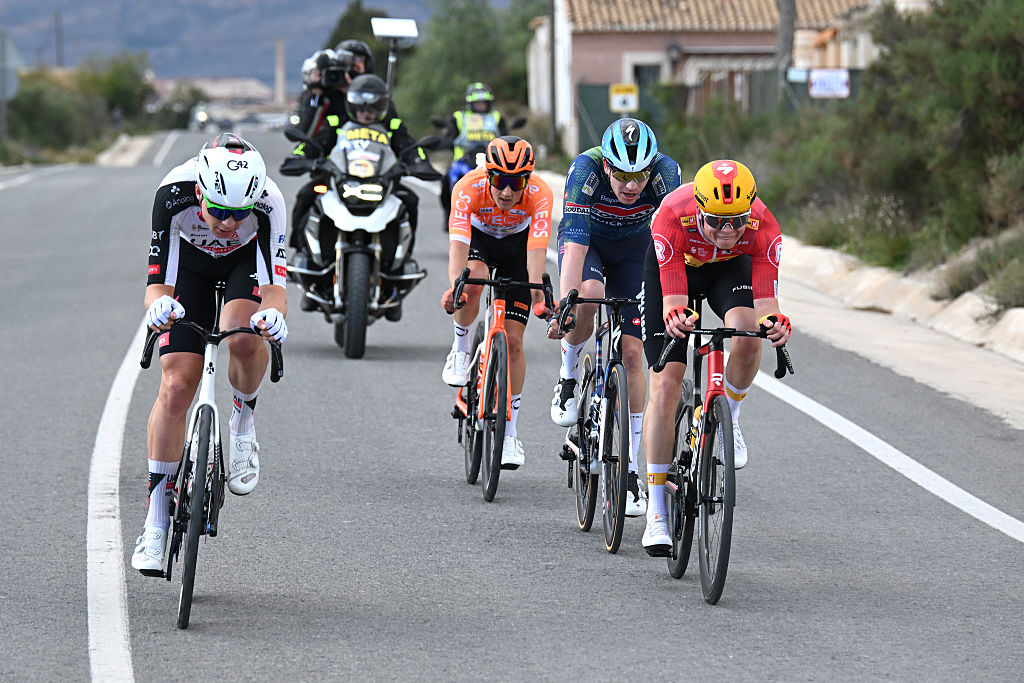 SAN VICENTE DEL RASPEIG, SPAIN - FEBRUARY 06: (L-R) Florian Vermeersch of Belgium UAE Team Emirates - XRG, Jonathan Vervenne of Belgium and Team Soudal Quick-Step and Adne Holter of Norway and Team Uno-X Mobility compete in the breakaway during the 77th Volta Comunitat Valenciana 2026, Stage 3 a 158km stage from Orihuela to San Vicente del Raspeig 115m on February 06, 2026 in San Vicente del Raspeig, Spain. (Photo by Szymon Gruchalski/Getty Images)