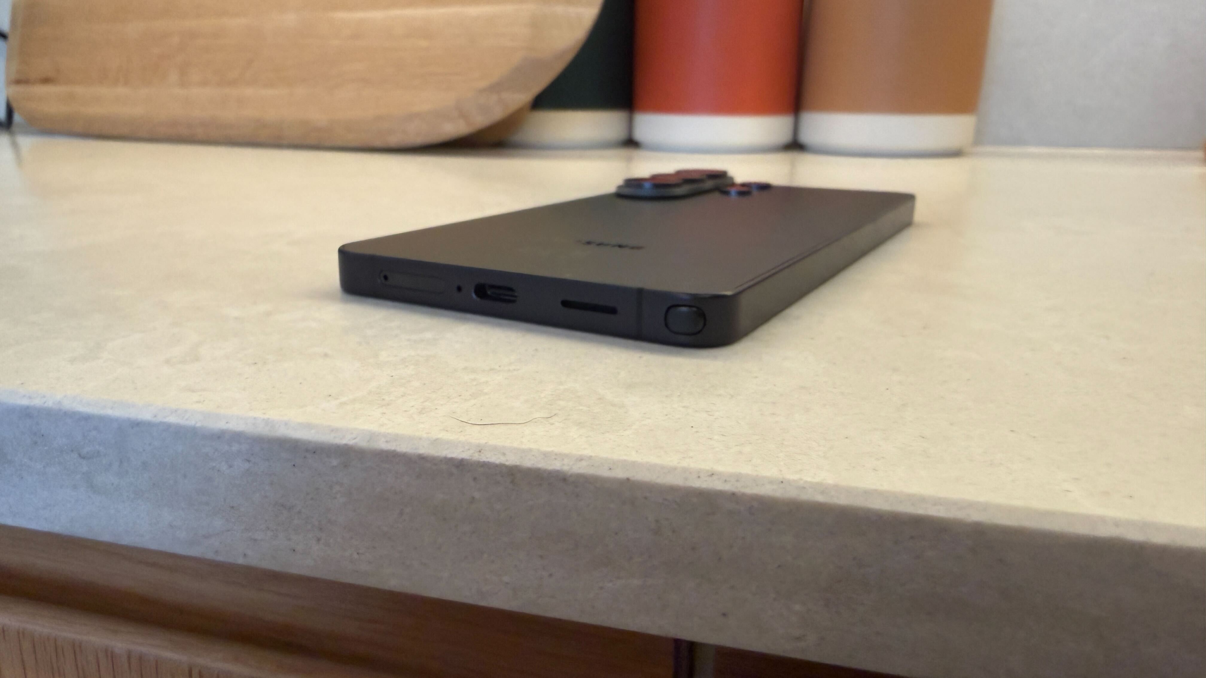 A shot of the Samsung Galaxy S26 Ultra lying face-down on a kitchen countertop
