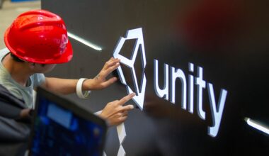 A worker installs Unity logo at Unity Technologies booth one day before the China Digital Entertainment Expo &amp; Conference (ChinaJoy) at Shanghai New International Expo Center on August 1, 2019 in Shanghai, China.