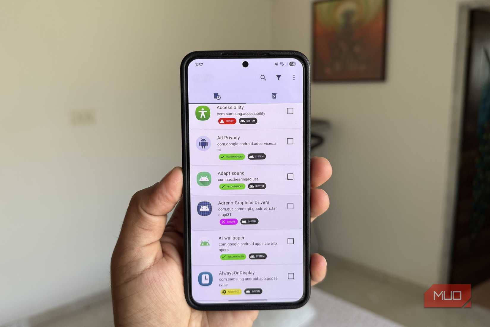 Android phone in hand showing Canta app