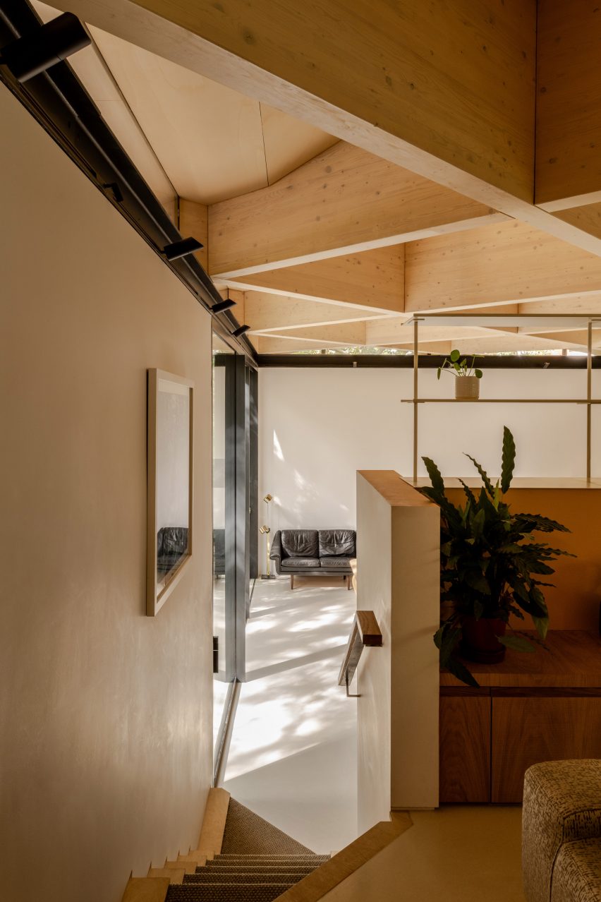 Exposed timber diagrid roof in Arbour House by Andrei Saltykov