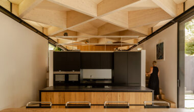 Kitchen with exposed timber diagrid roof in Arbour House by Andrei Saltykov