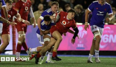 Wales Under-20s scrum-half Sion Davies carries the ball against France
