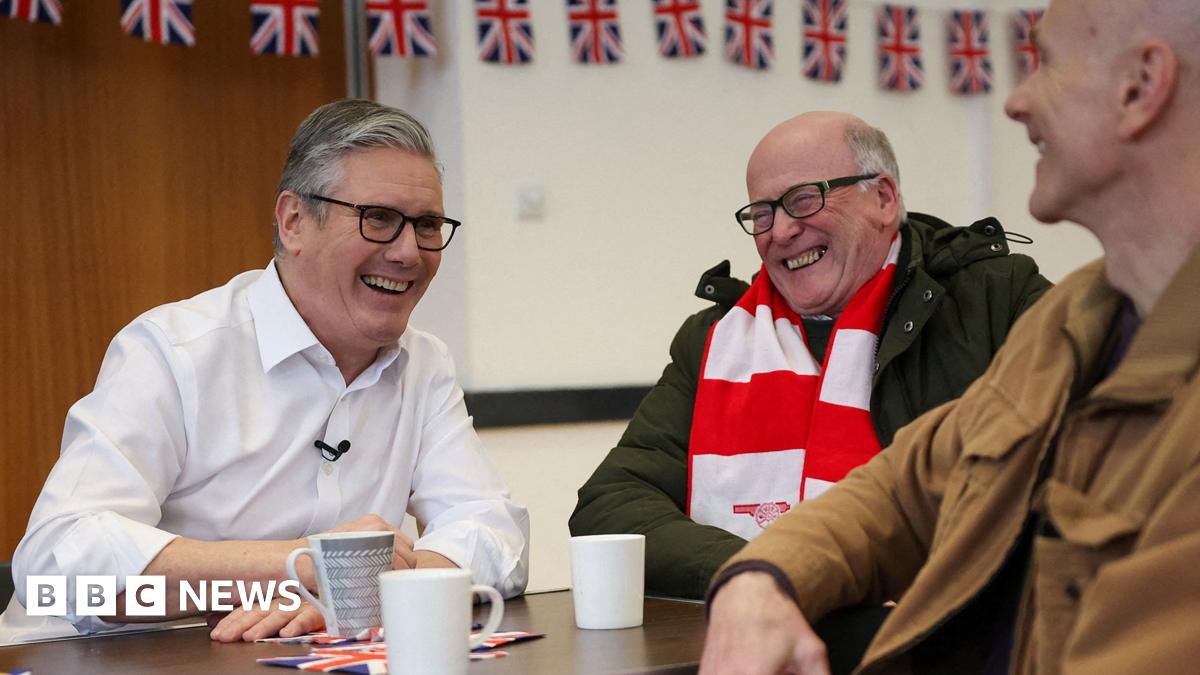 Prime Minister Sir Keir Starmer smiles during a meeting with locals at a community centre in Hertfordshire.