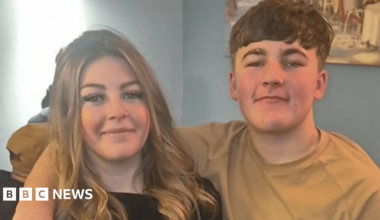 The picture shows two people smiling at the camera. Cherish Bean on the left has brown, long hair, and Ethan Slater on the right has short brown hair.