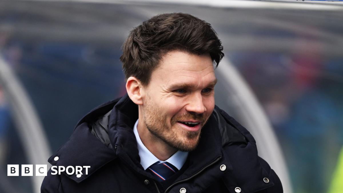 Danny Rohl smiles on the touchline before Rangers' Scottish Cup tie against Queen's Park
