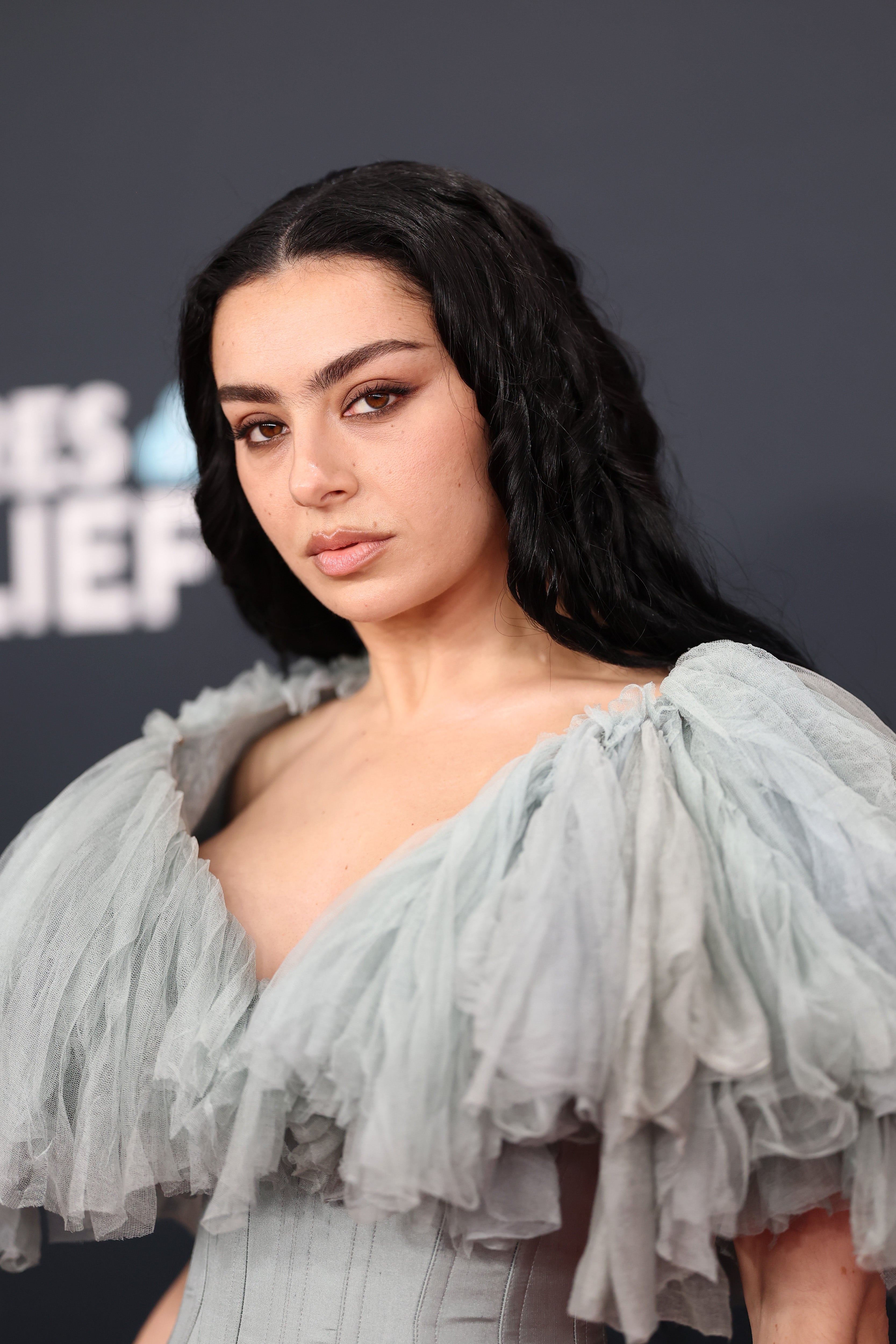 Singer Charli XCX was questioned over decision to not want children on Bateman’s podcast