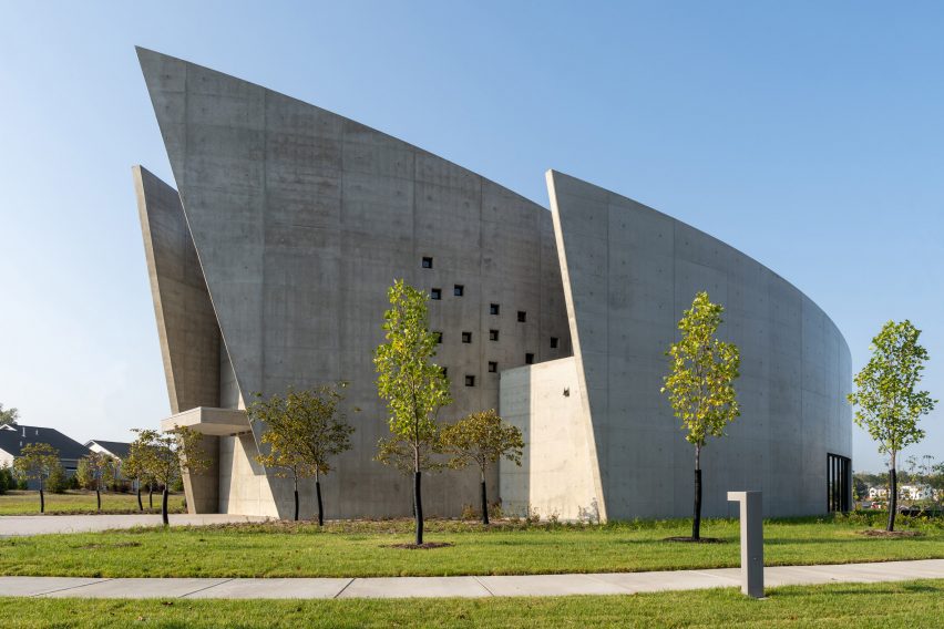 Curving concrete chapel