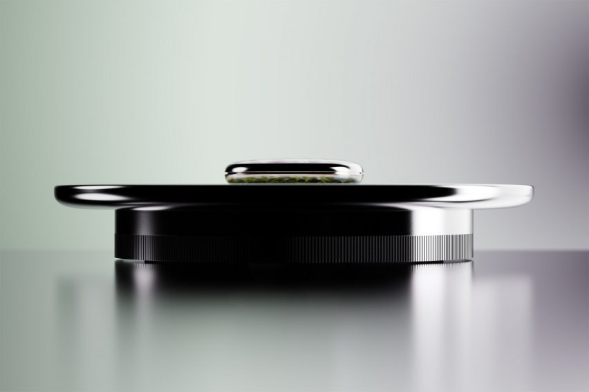 Image of the Cognitive Bloom device from the side, showing the smaller Pond element sitting on top of the circular Garden