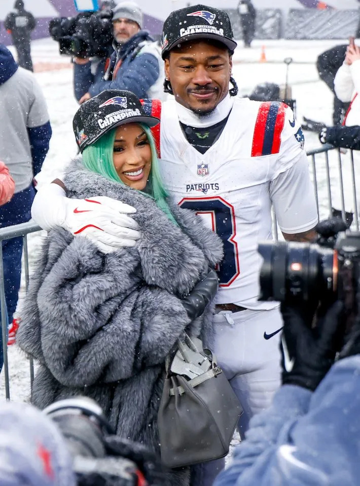 Cardi B and Stefon Diggs celebrate after the NFL AFC Championship game on Jan. 25, 2026 Lauren Leigh Bacho/Getty 