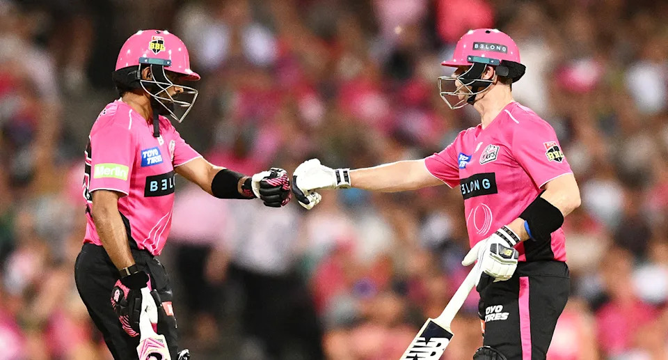 Sydney Sixers teammates Babar Azam and Steve Smith will be on opposing sides in the upcoming Pakistan Super League. Pic: Getty