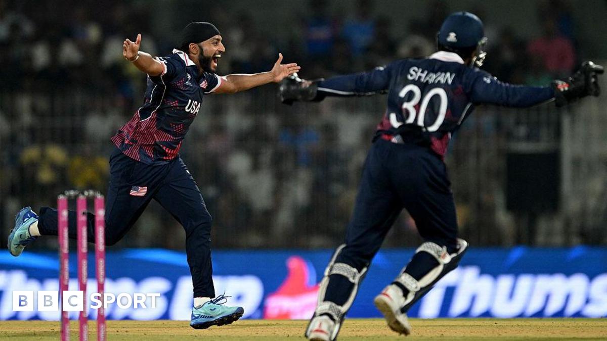 USA's Harmeet Singh spreads his arms out in celebration of taking his seventh wicket of the 2026 T20 World Cup