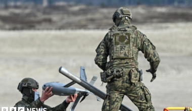 Polish Army soldiers prepare an interceptor drone during a live-fire demonstration in Poland in November 2025