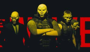 Hackers stand in front of a red sign.