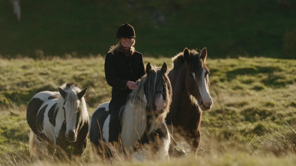 Amanda riding with her three horses near Ravenseat.